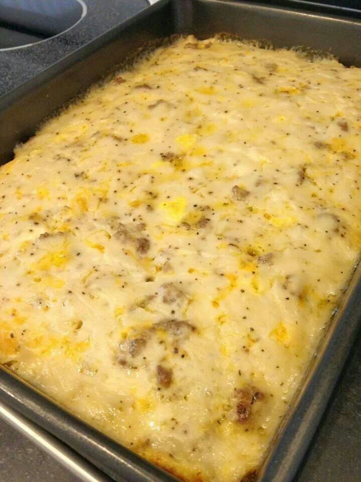 Country-Style Biscuits and Gravy with Eggs and Sausage.